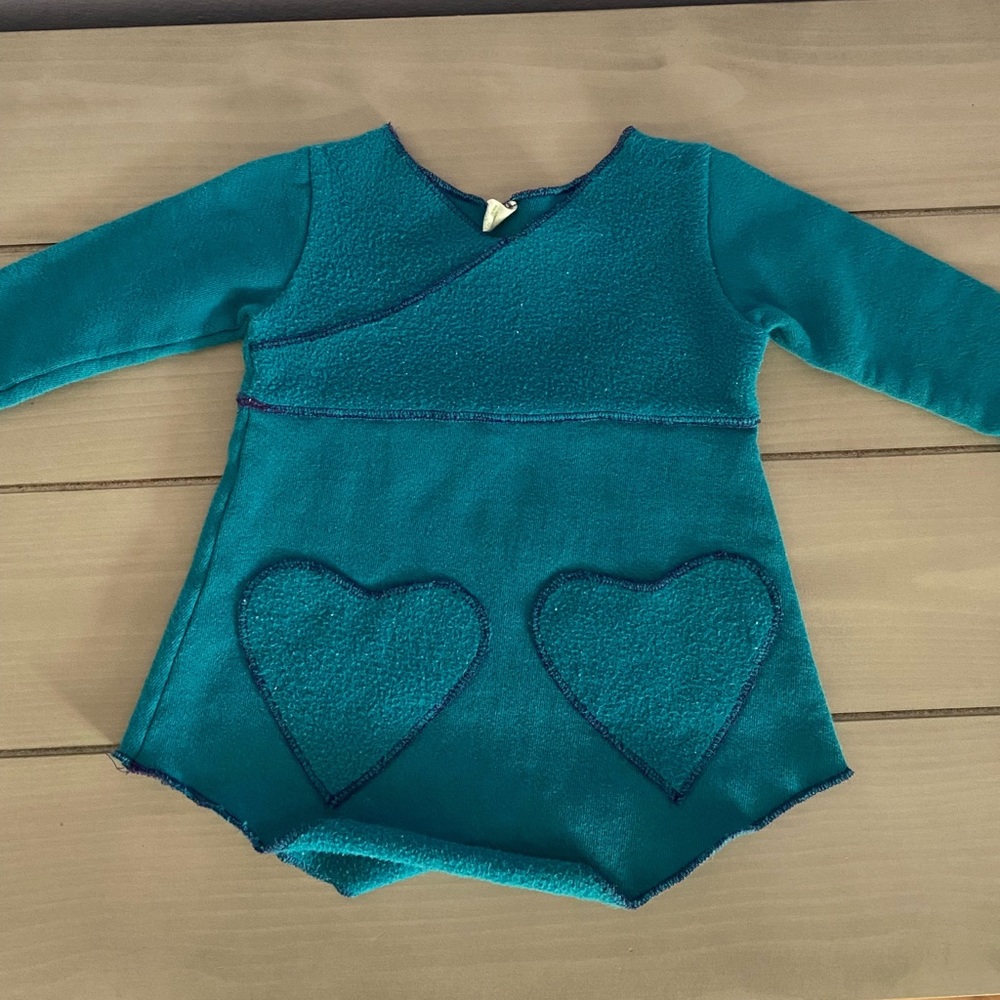 Blue sweater dress with heart pockets